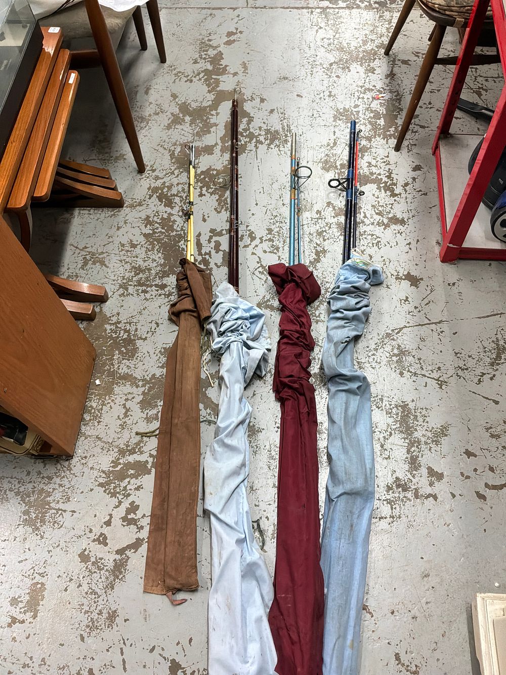 Lot 414: A Collection of Four Vintage Fibreglass Fishing Rods including a Shakespeare Example