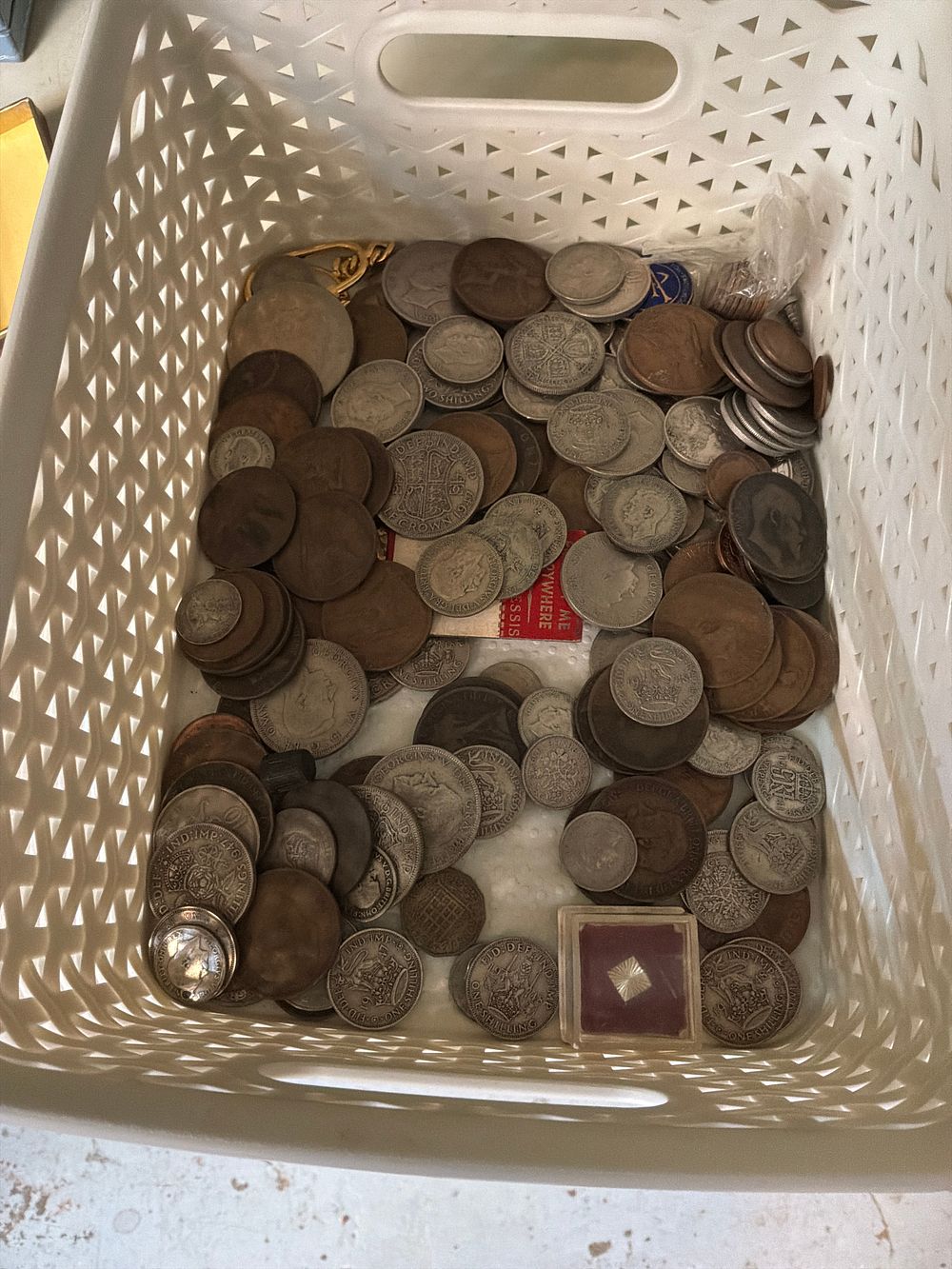 Lot 427: A Collection of British and World Coins including George V and George VI Examples