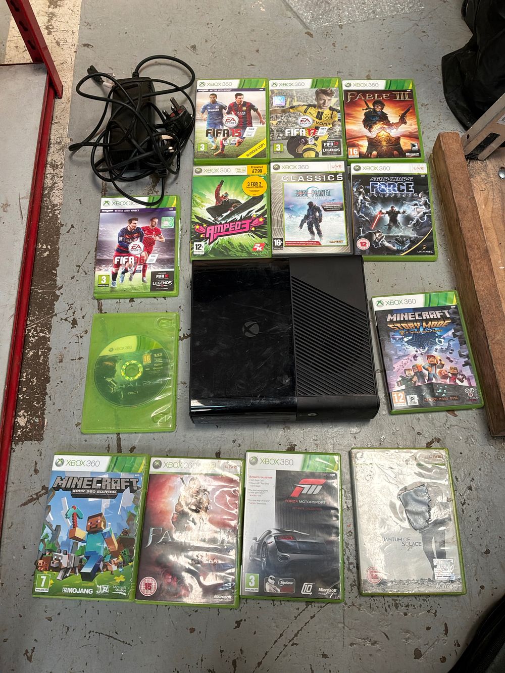 Lot 440: A Collection of Two Video Game Consoles including Xbox 360 and PlayStation 2 with Games
