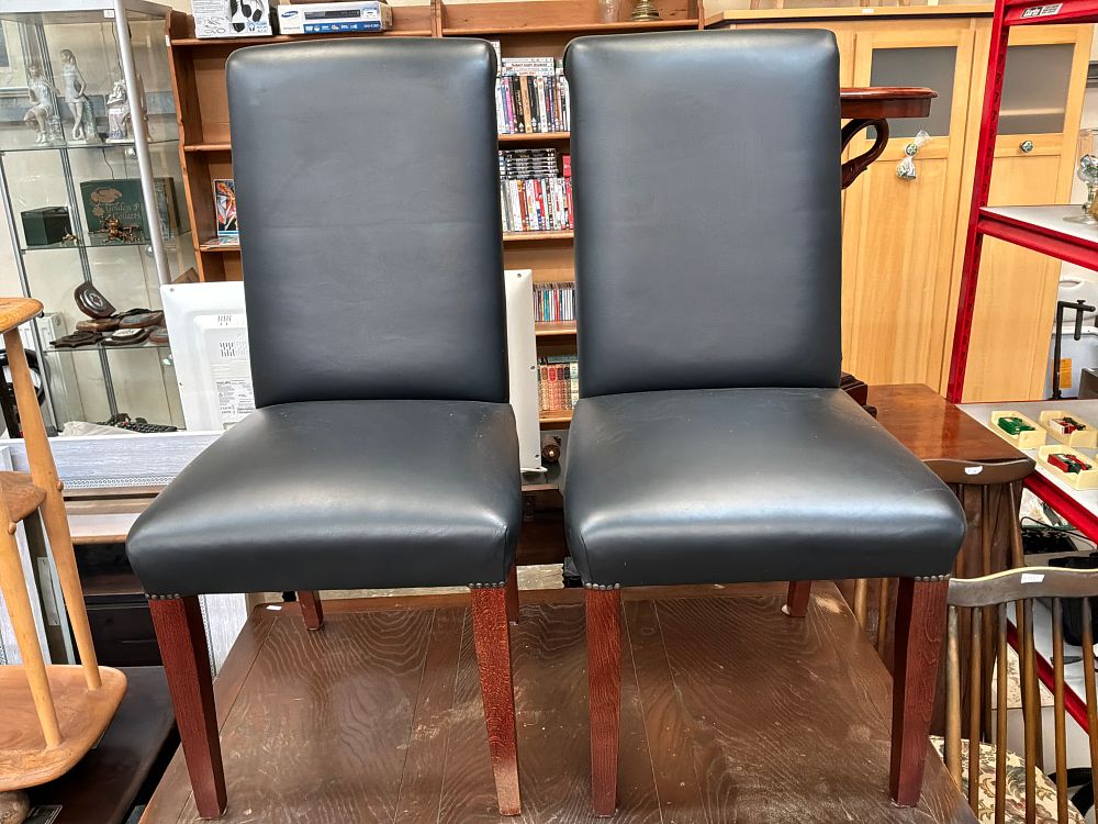 Lot 444: A Set of Eight Contemporary style Faux Leather High Back Dining Chairs