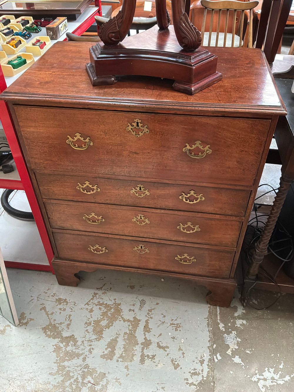 Lot 469: A George III Style Mahogany Bachelor Chest with Secretaire Drawer