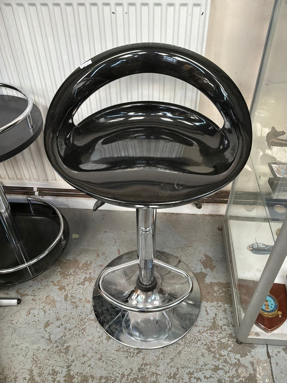 Lot 503: A Set of Three Contemporary Height Adjustable Swivel Bar Stools