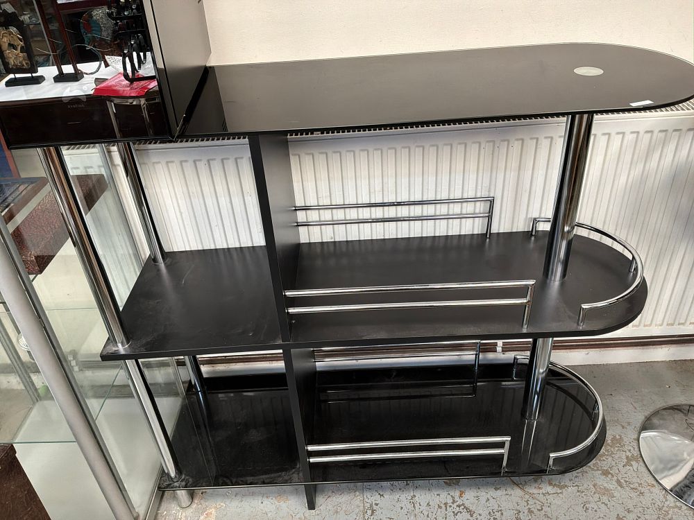 Lot 508: A Contemporary Art Deco Style Black Glass and Chrome Home Bar Unit