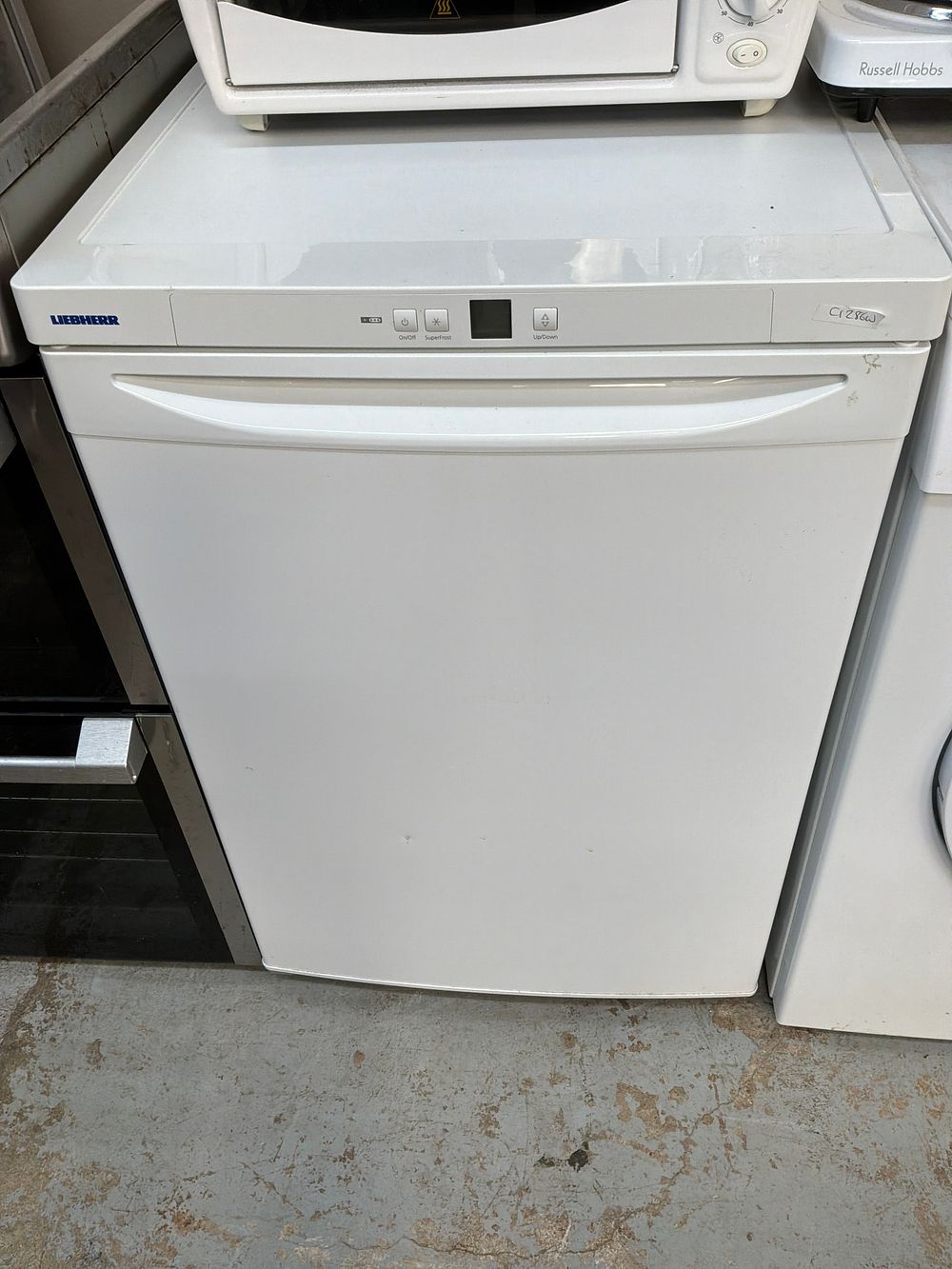 Lot 523: A Liebherr Under Counter Upright Freezer With Three Drawers