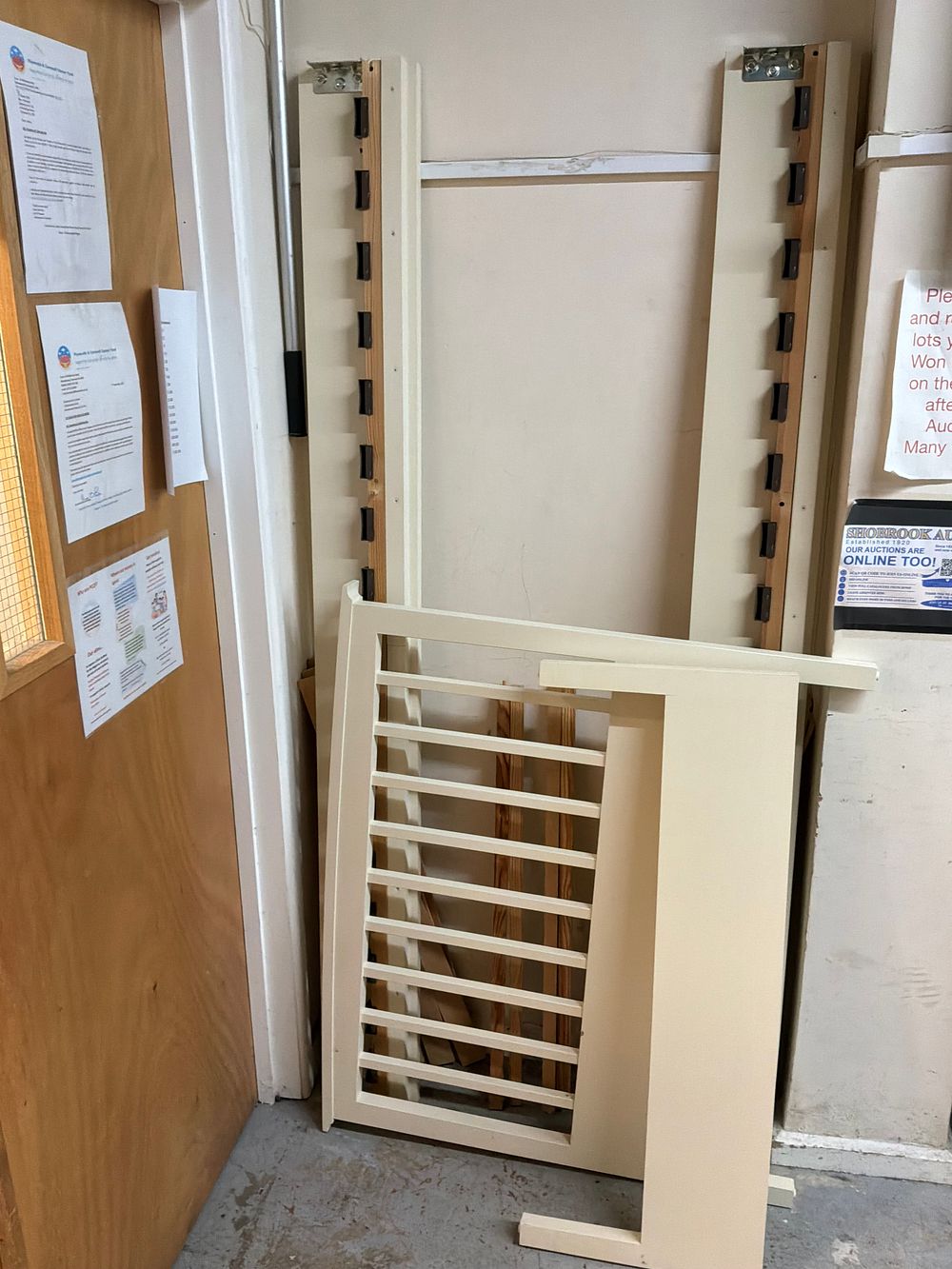 Lot 545: A Disassembled Painted Wood Single Bed Frame in Cream