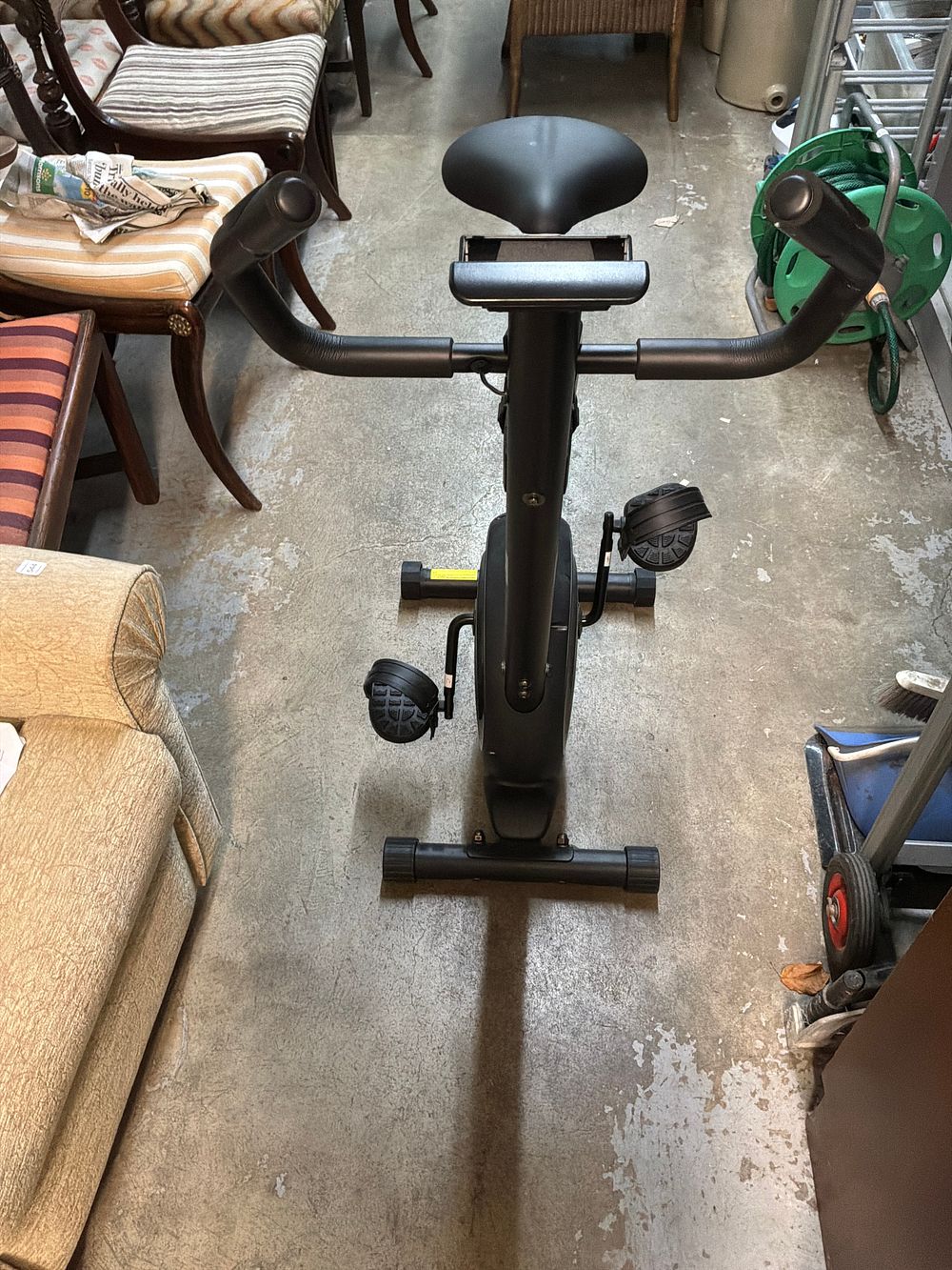 Lot 547: An Opti Black Powder Coated Tubular Steel Upright Exercise Bike