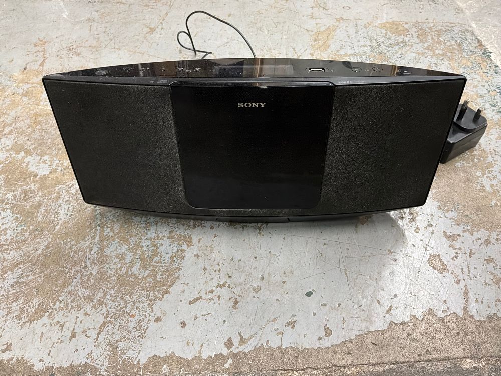 Lot 553: A Sony Audio System with Power Adapter and Antenna