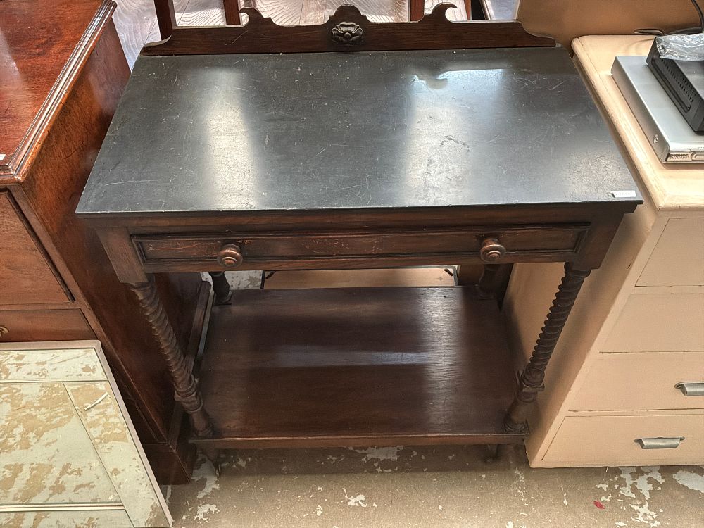 Lot 467: A Late Victorian or Edwardian Oak Washstand with Slate Top and Barley Twist Legs