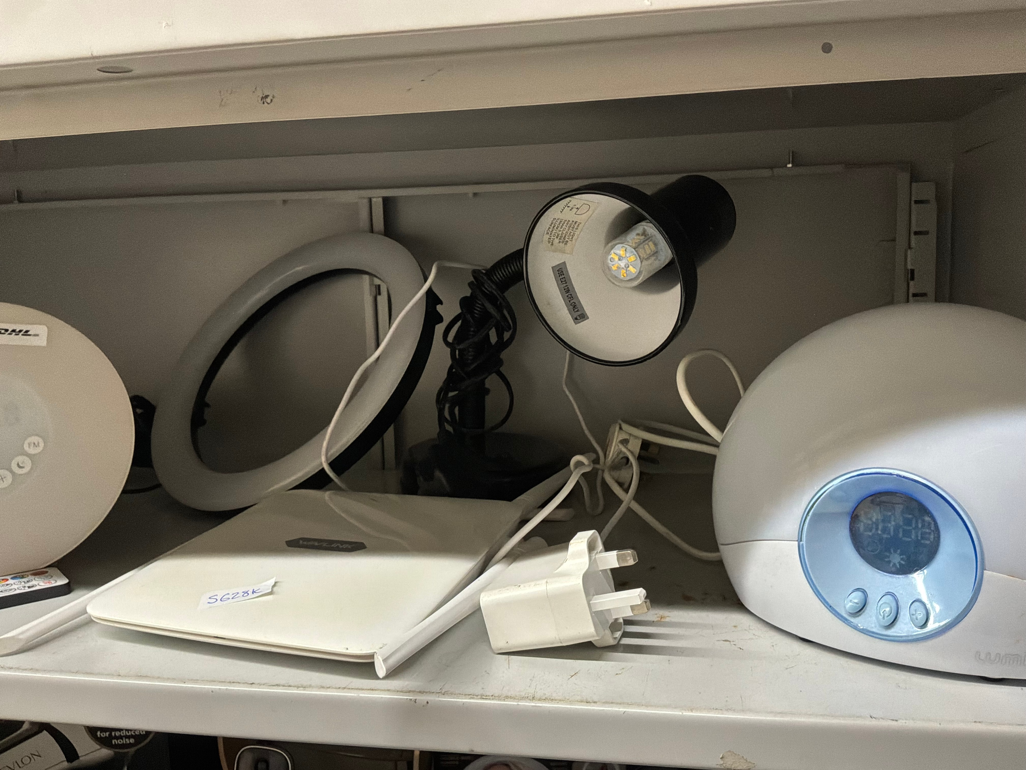 A Collection of Home Lighting and Networking Equipment including Lumie and Wavlink Examples