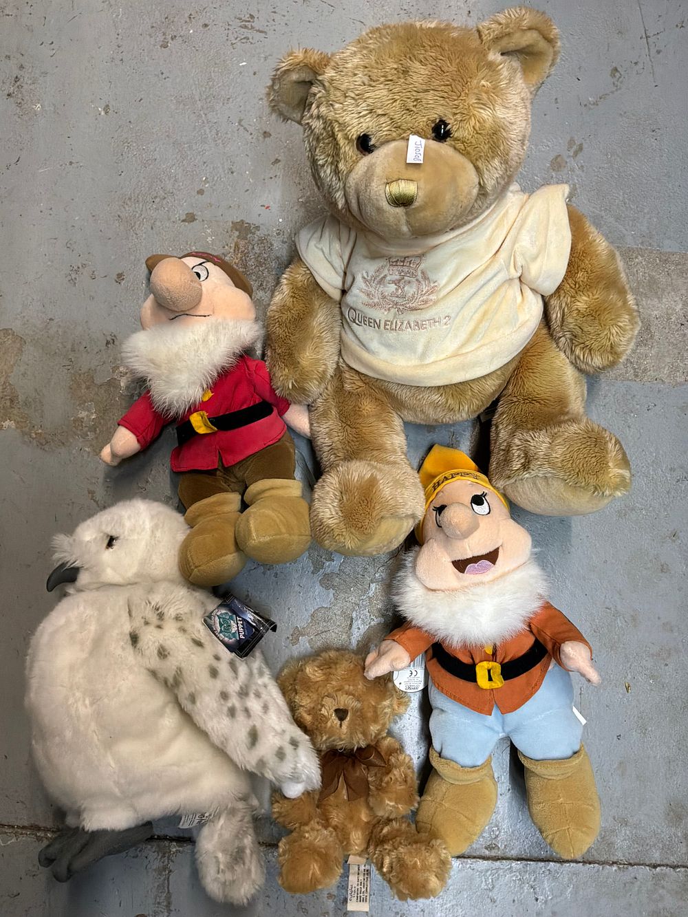 Lot 199: A Collection of Plush Toys Including Cunard and Disney Examples