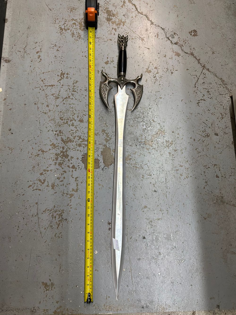 Lot 212: A Contemporary Fantasy style Display Sword with Cast Metal Hilt