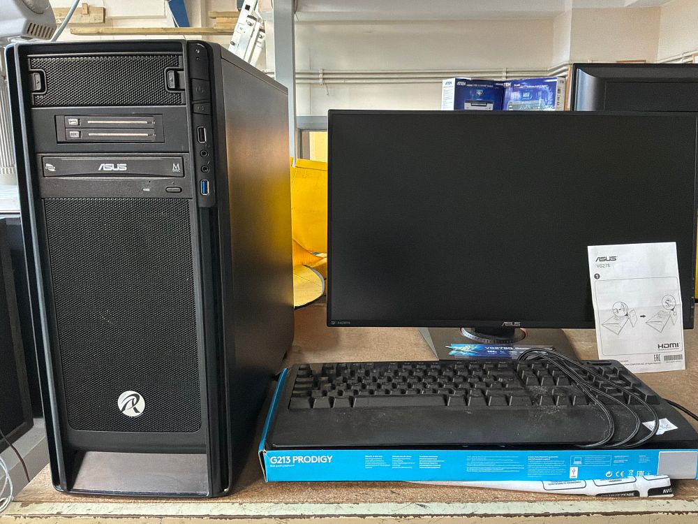 Lot 245: A Desktop Computer Workstation including Asus Gaming Monitor and Logitech Keyboard