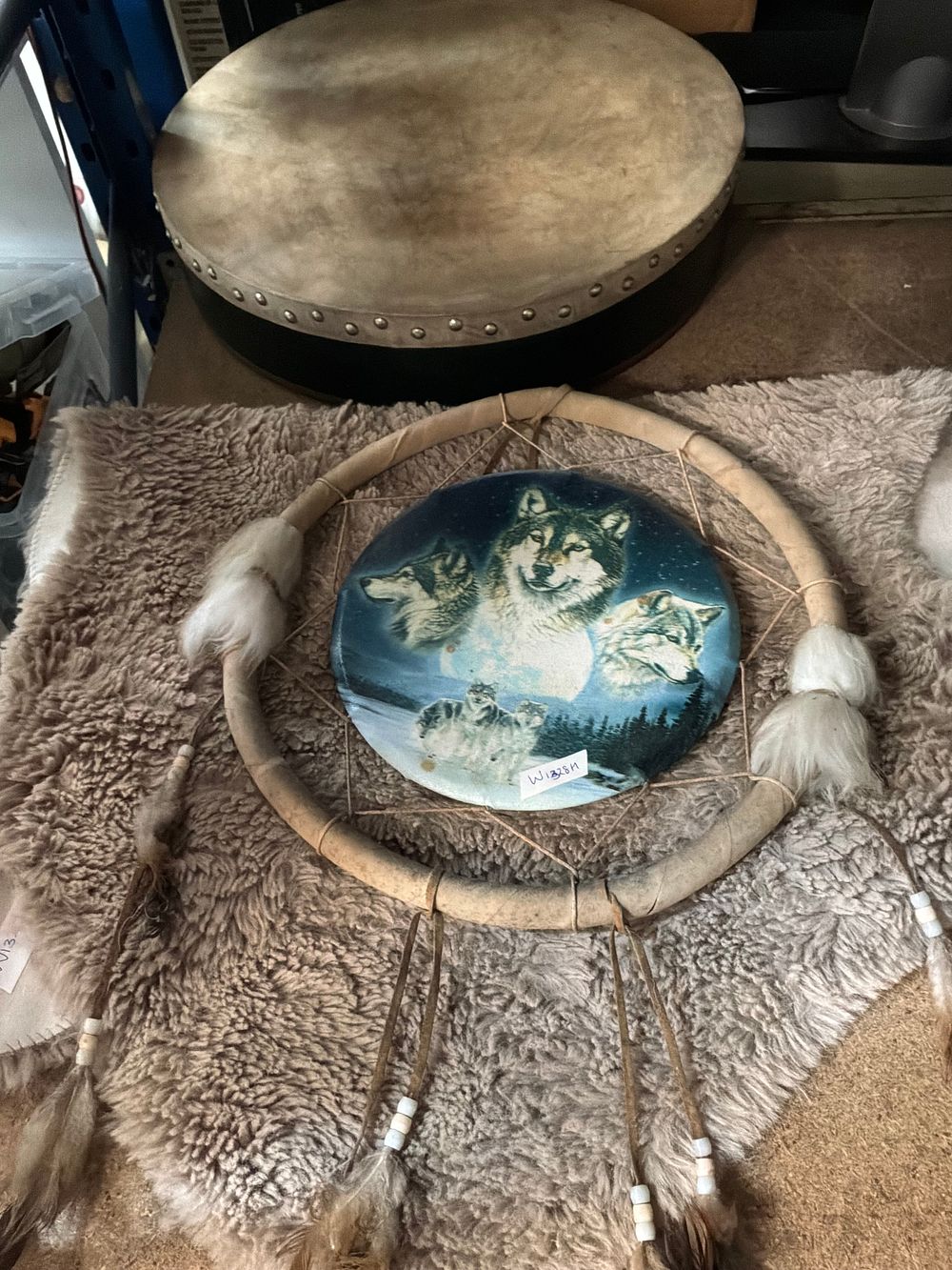 Lot 247: Two Decorative Native American Style Items Including a Frame Drum and a Wolf Motif Mandella