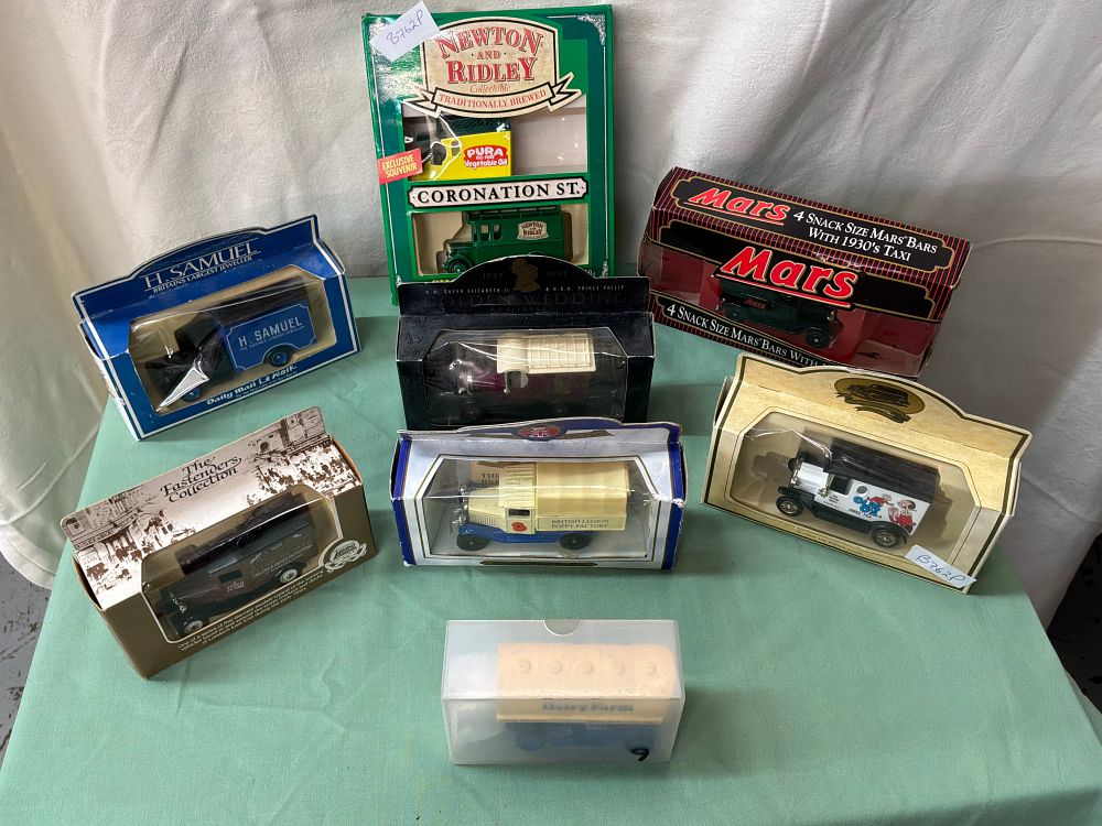 Lot 255: A Collection of Eight Die-cast Metal Promotional Vehicles including Lledo Examples