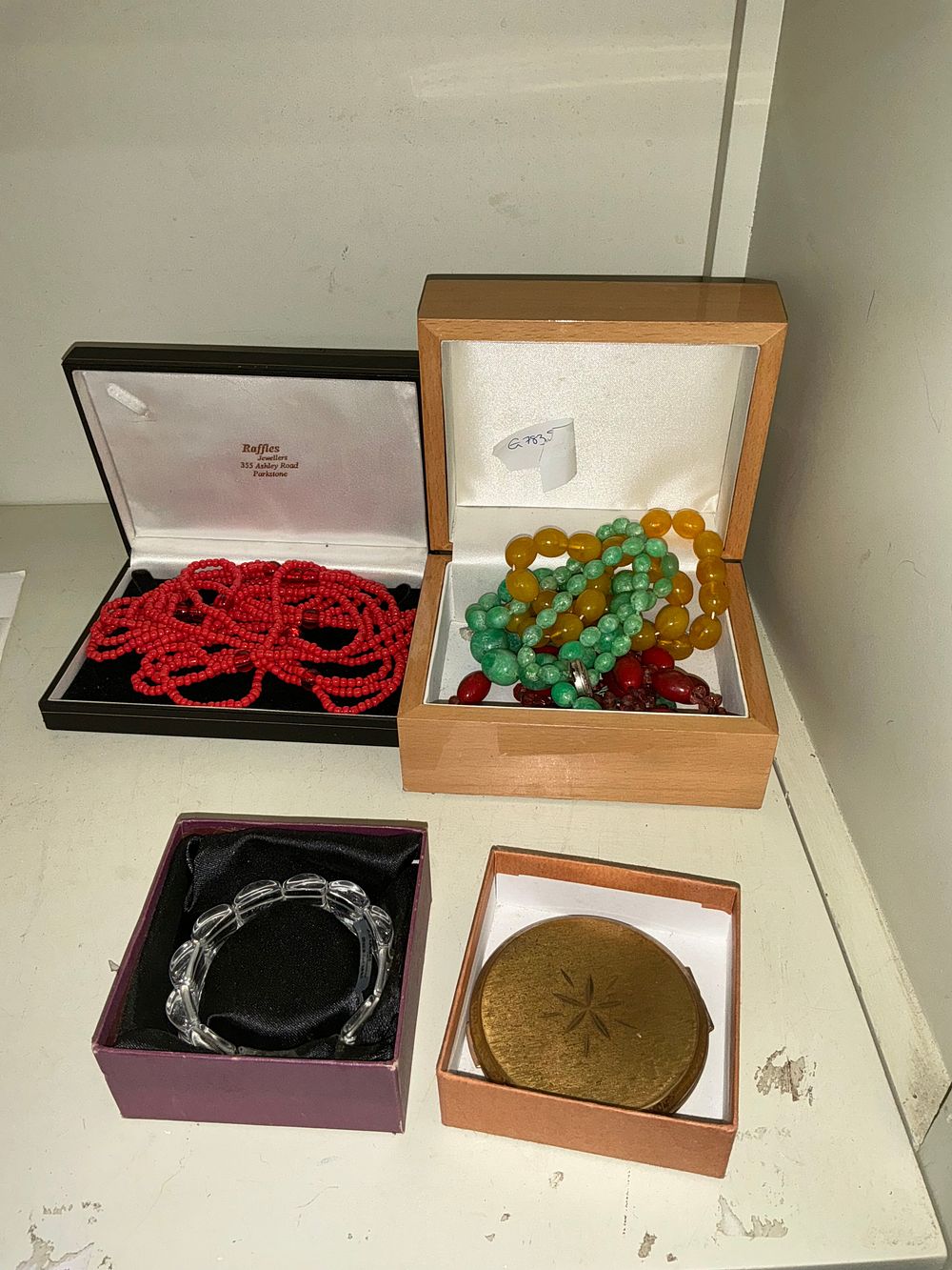 Lot 276: A Collection of Bead Necklaces and Costume Jewellery Including a Raffles Retailer Box