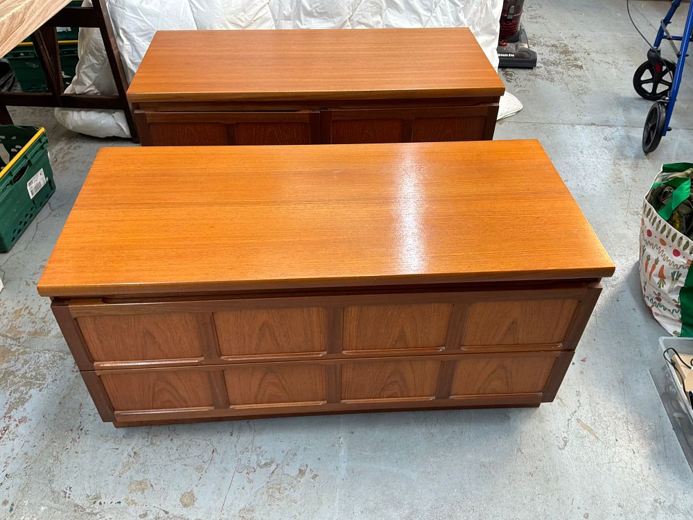 Lot 296: A Pair of Mid-Century Modern style Teak Parker Knoll Low Storage Cabinets
