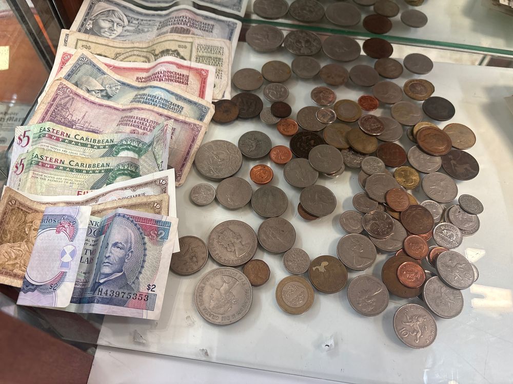 Lot 302: A Collection of Banknotes and Coins including Yugoslavian and Eastern Caribbean Examples