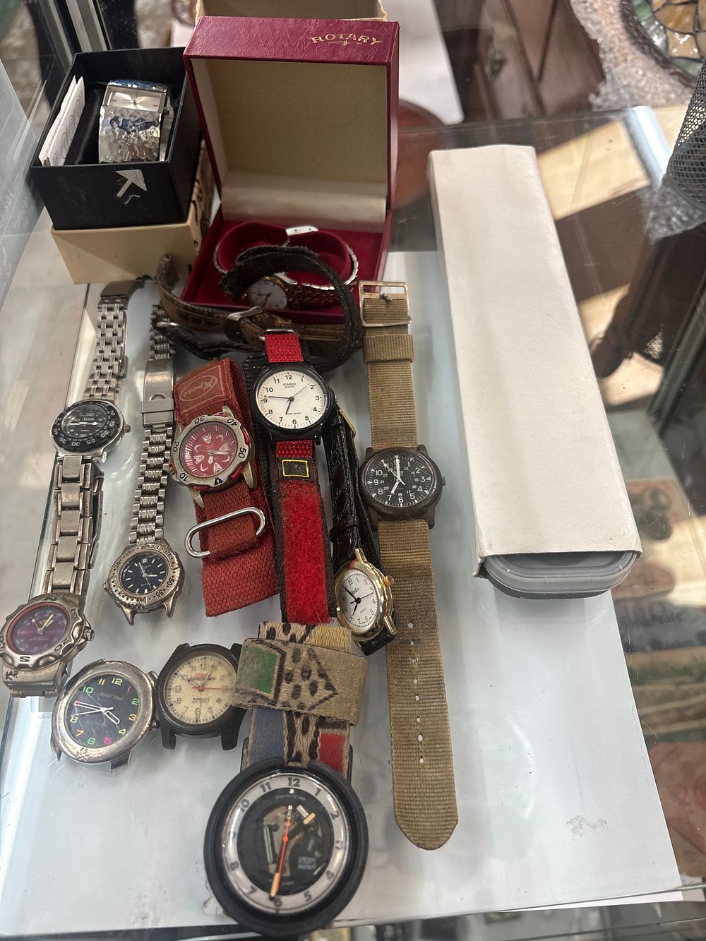 Lot 308: A Collection of Fourteen Men's and Women's Wristwatches including Sekonda, Rotary, Casio, and Swatch Examples