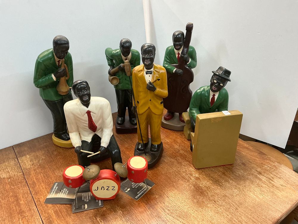 Lot 324: A Collection of Six Jazz Band Figurines and Accessories