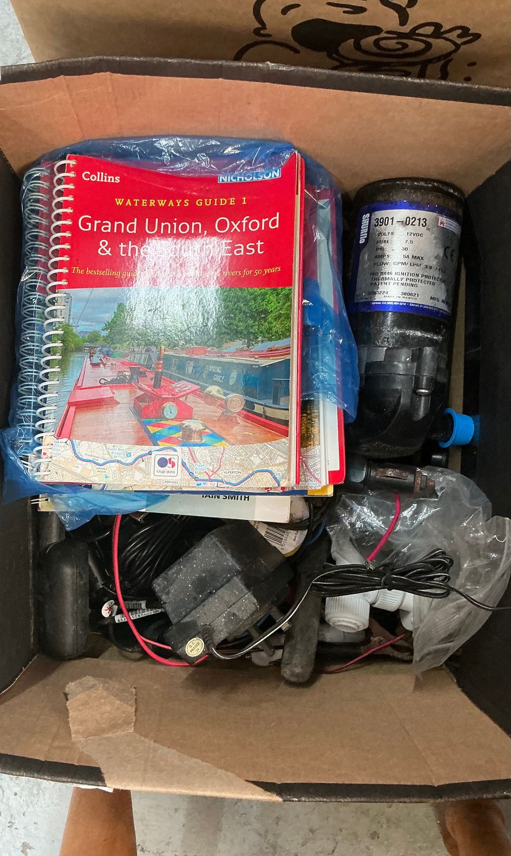 Lot 327: A Collection of Marine and Automotive Equipment Including a Ford Electric Vehicle Charging Cable, Hose Pipe on Reel and Hook Up Leads