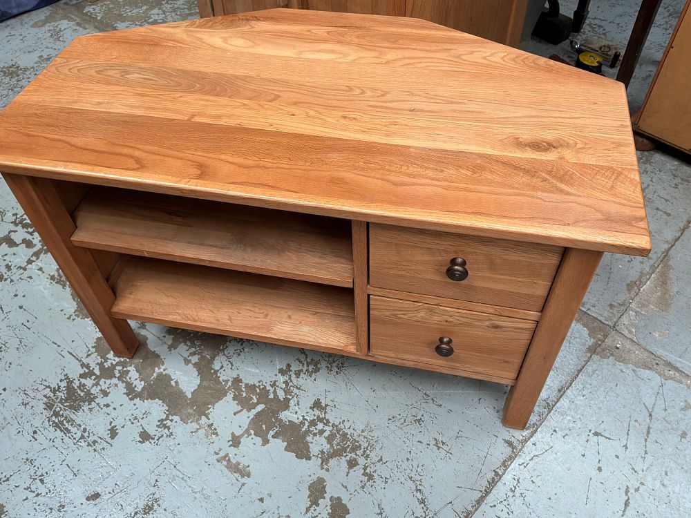 Lot 334: A Contemporary Oak and Oak Veneer Corner Television Stand
