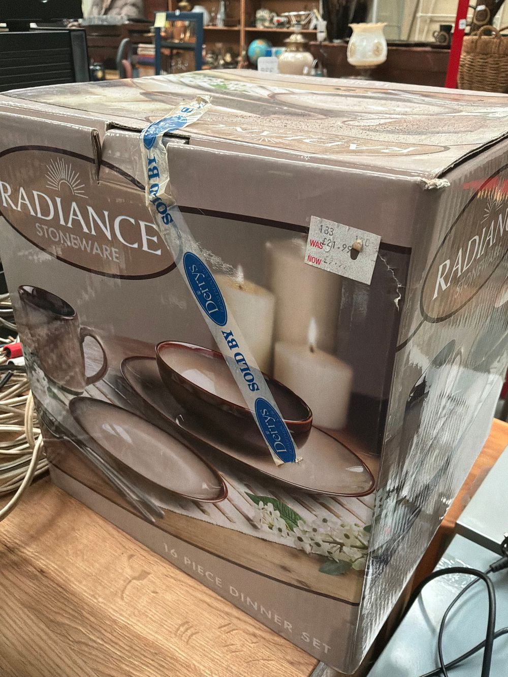 Lot 338: A Sixteen Piece Set of Radiance Stoneware Nova Brown Dinnerware in Original Retail Packaging