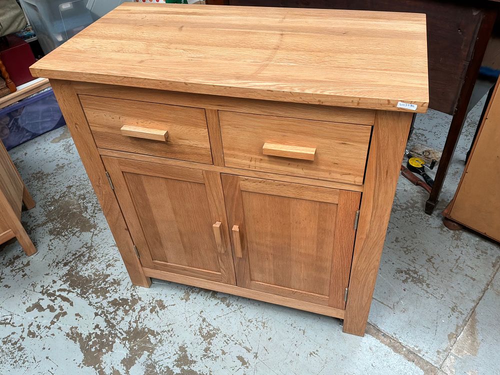 Lot 339: A Contemporary Oak Sideboard with Two Drawers and Two Doors