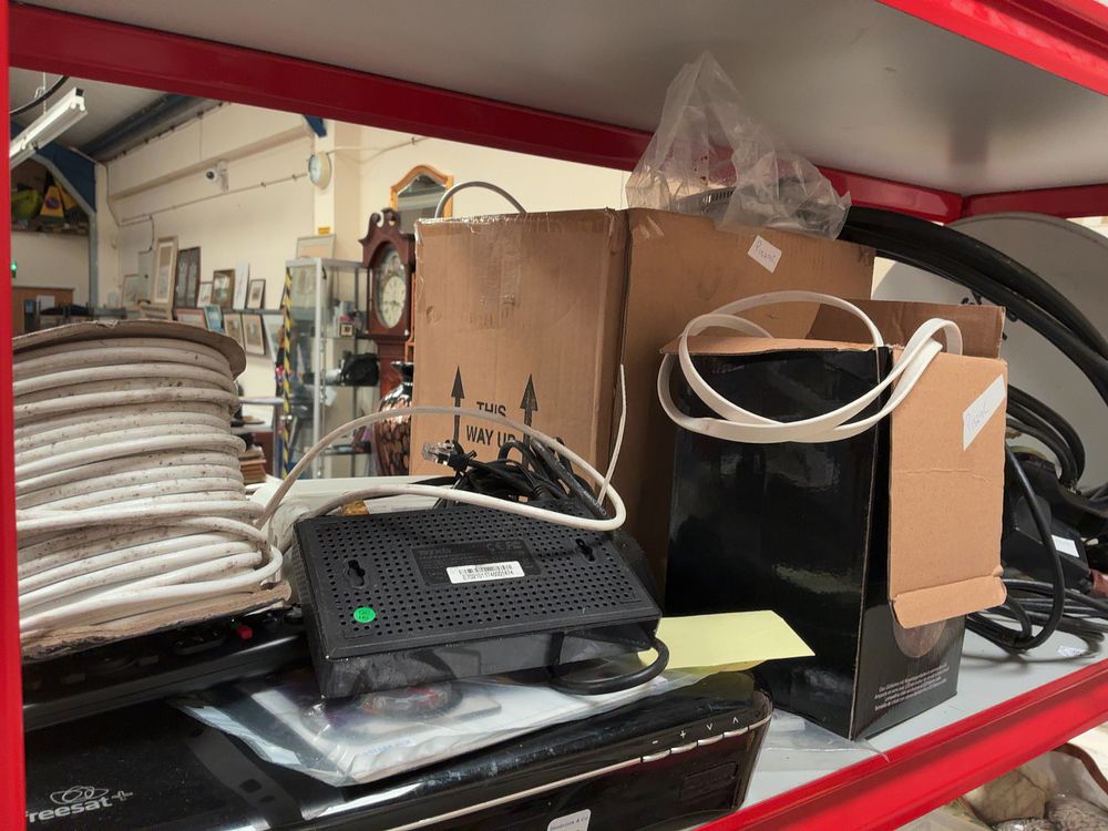 Lot 340: A Collection of Portable Satellite Television and Networking Equipment Including Humax and BT Examples