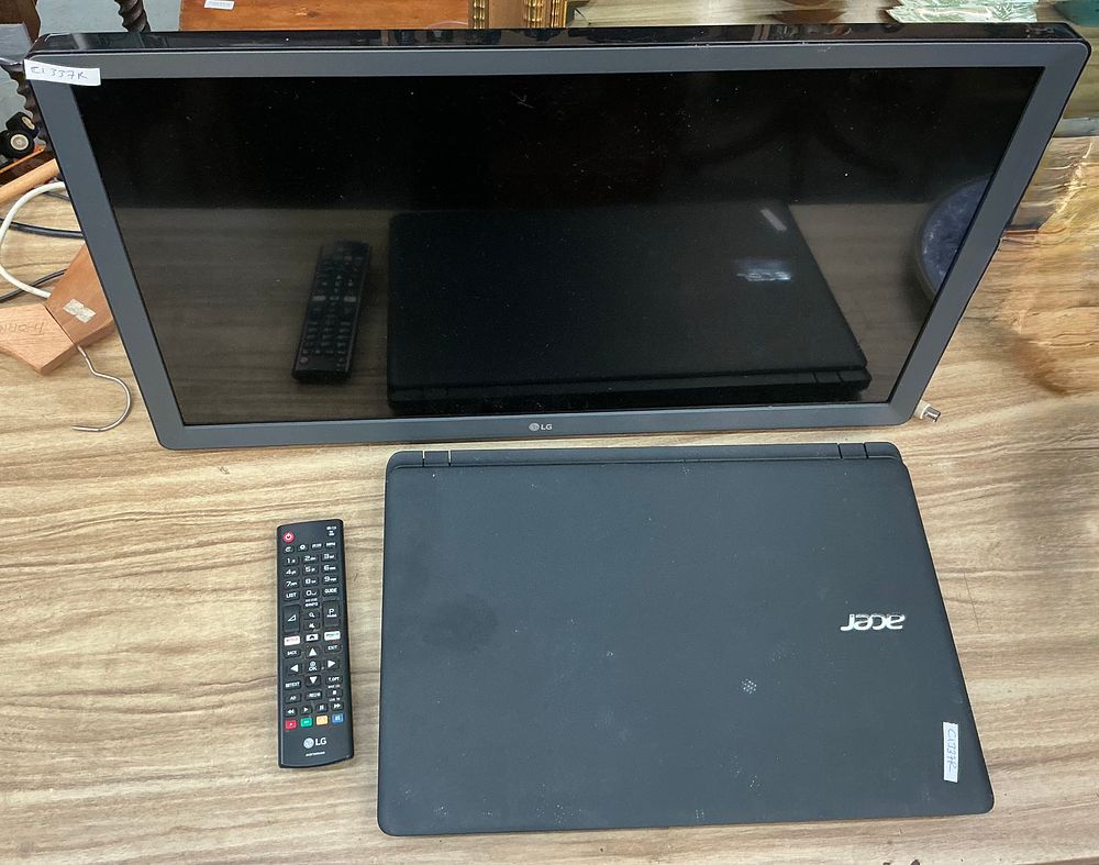 Lot 352: Two Electronics Comprising An LG Monitor And An Acer Aspire Laptop