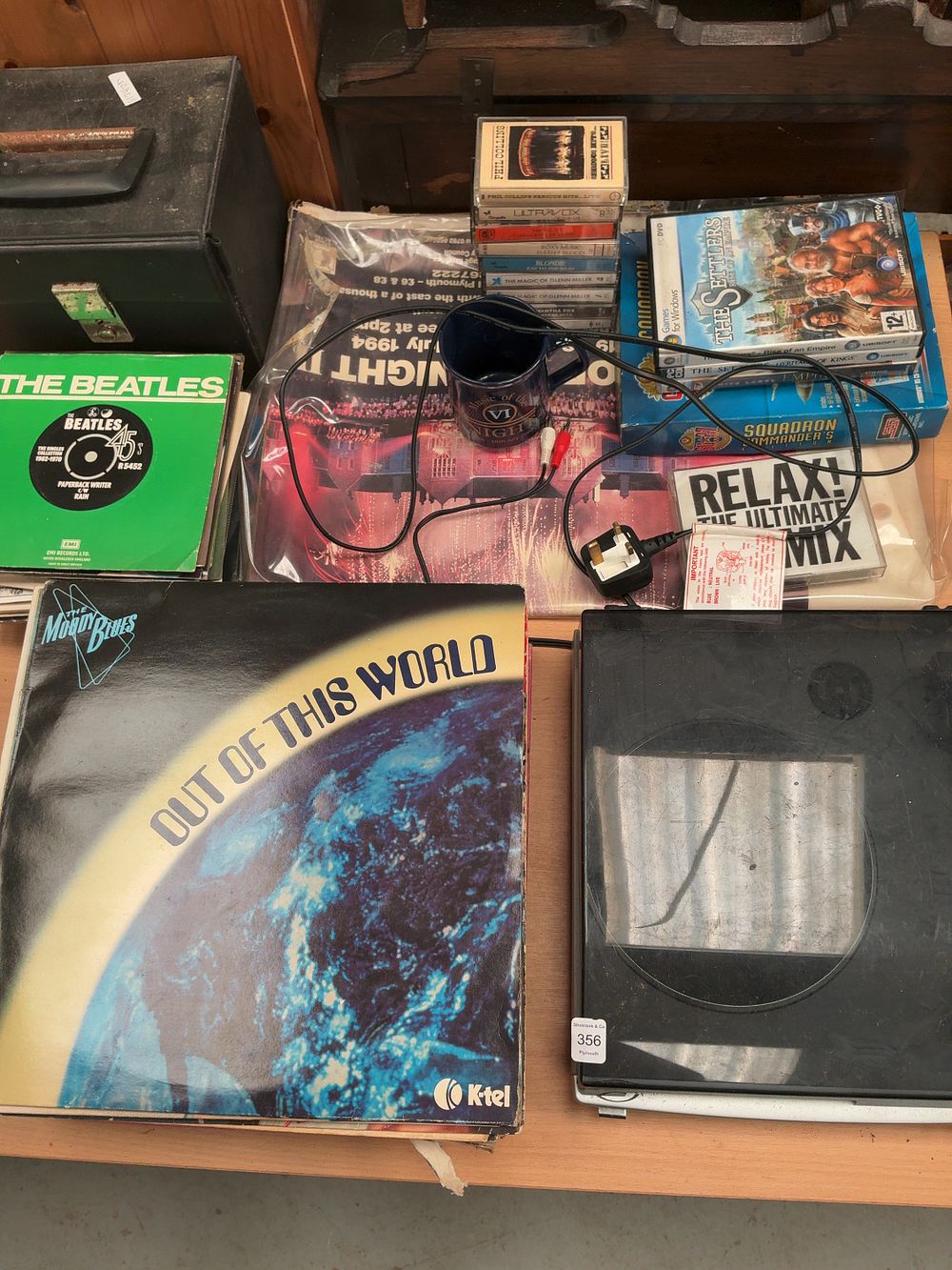 Lot 356: A Collection of Music Media and Electronics Including a Bush Acoustics Turntable and a Beatles Singles