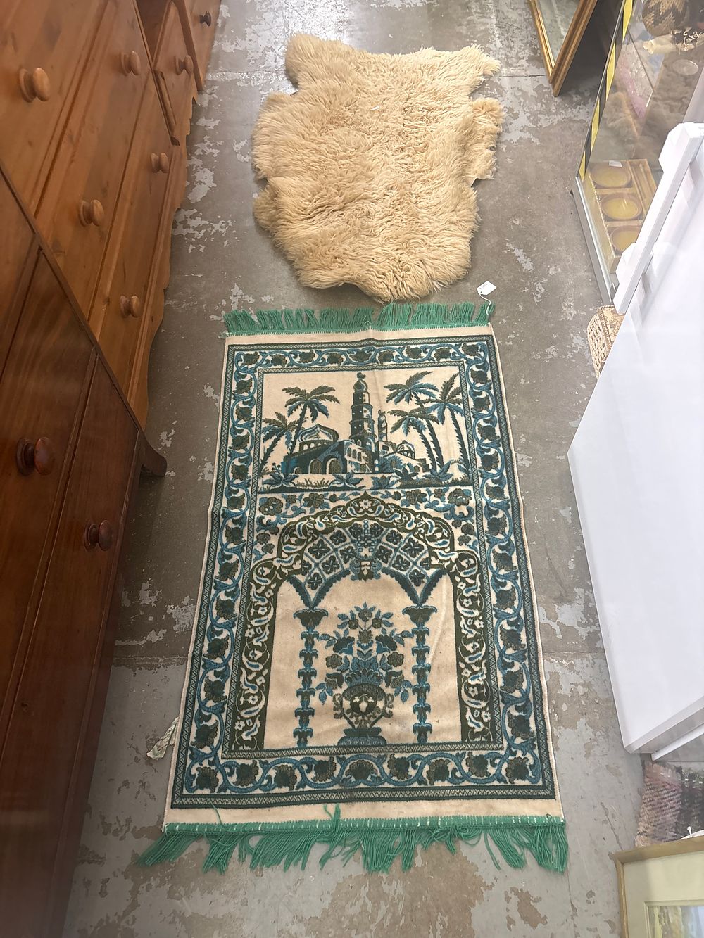 Lot 380: Two Rugs including a Turkish style Velvet Prayer Mat and a Natural Sheepskin Rug