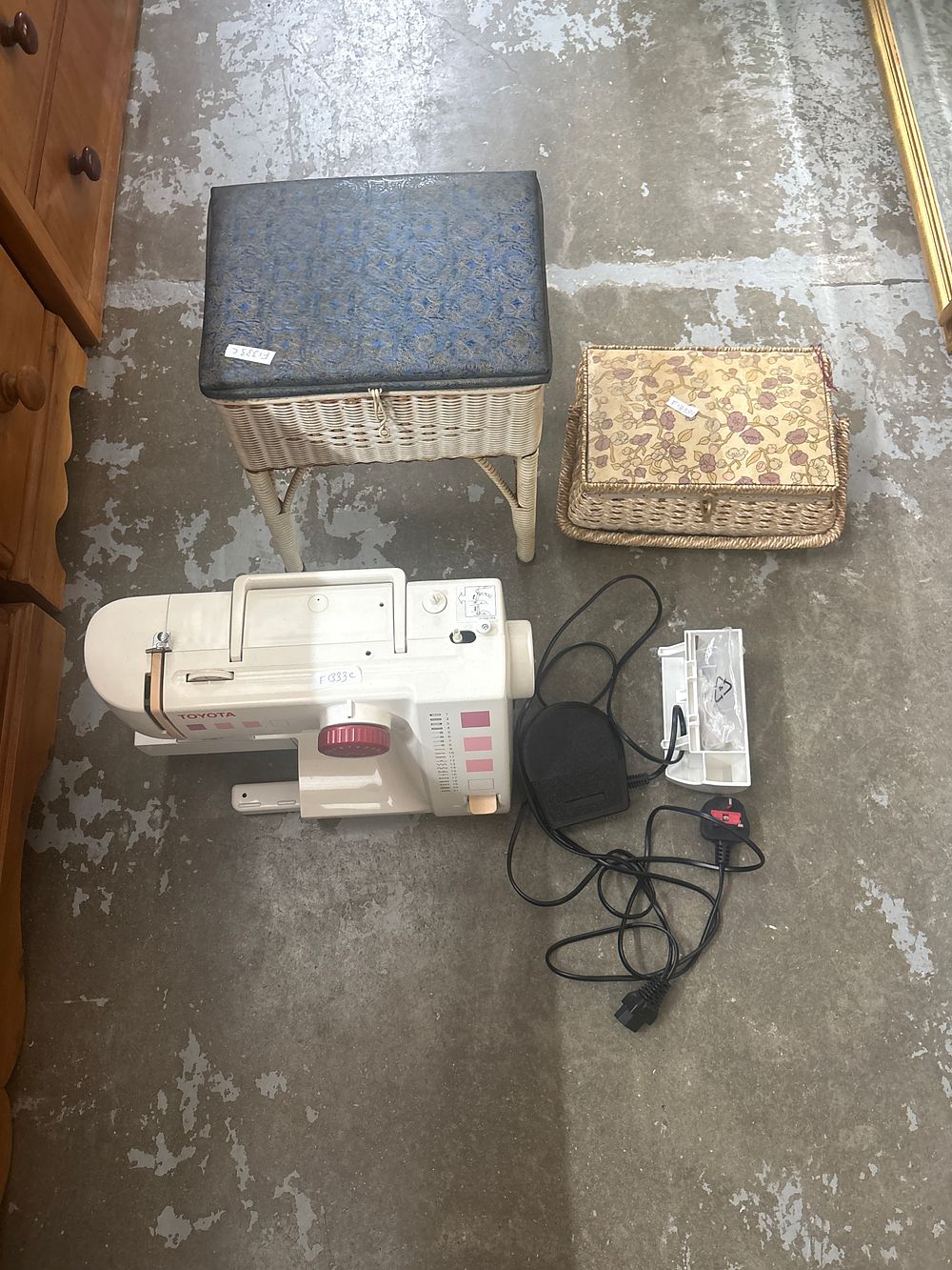 Lot 388: A Toyota Electric Sewing Machine with Two Woven Sewing Storage Items