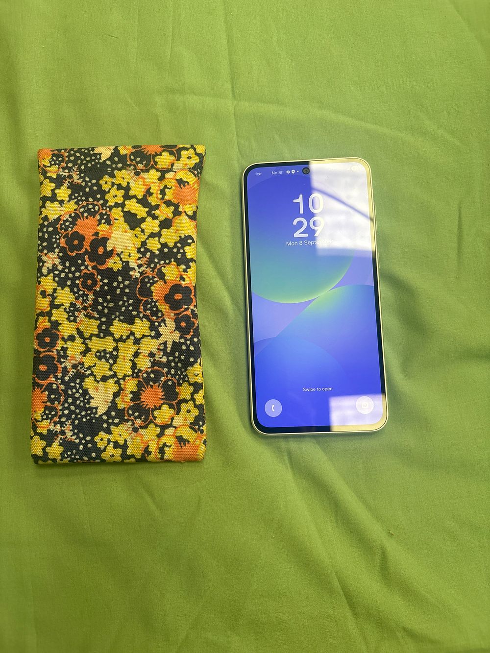 Lot 74: A Samsung Smartphone and Fabric Protective Sleeve