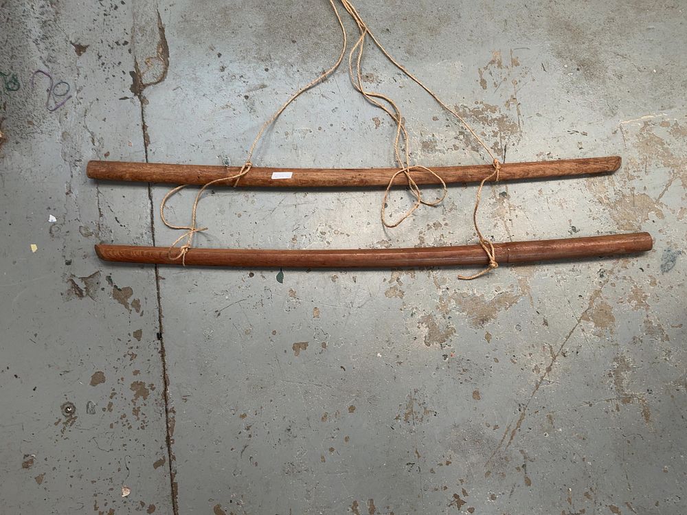 Lot 210: A Pair of Japanese Style Wooden Training Swords