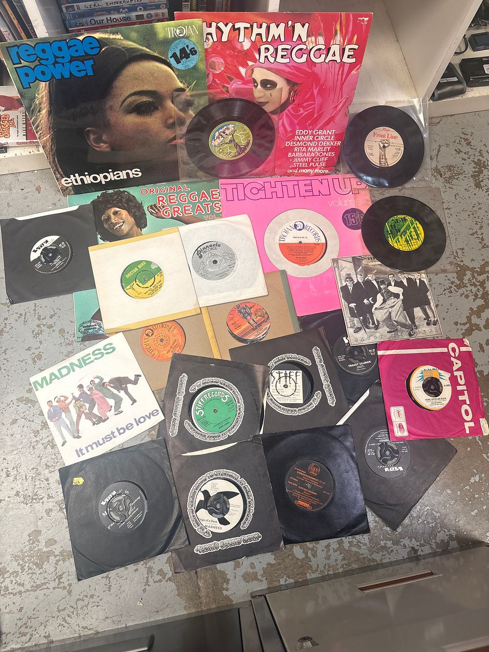 Lot 250: A Collection of Vinyl Records Including Trojan Records and Stiff Records Examples