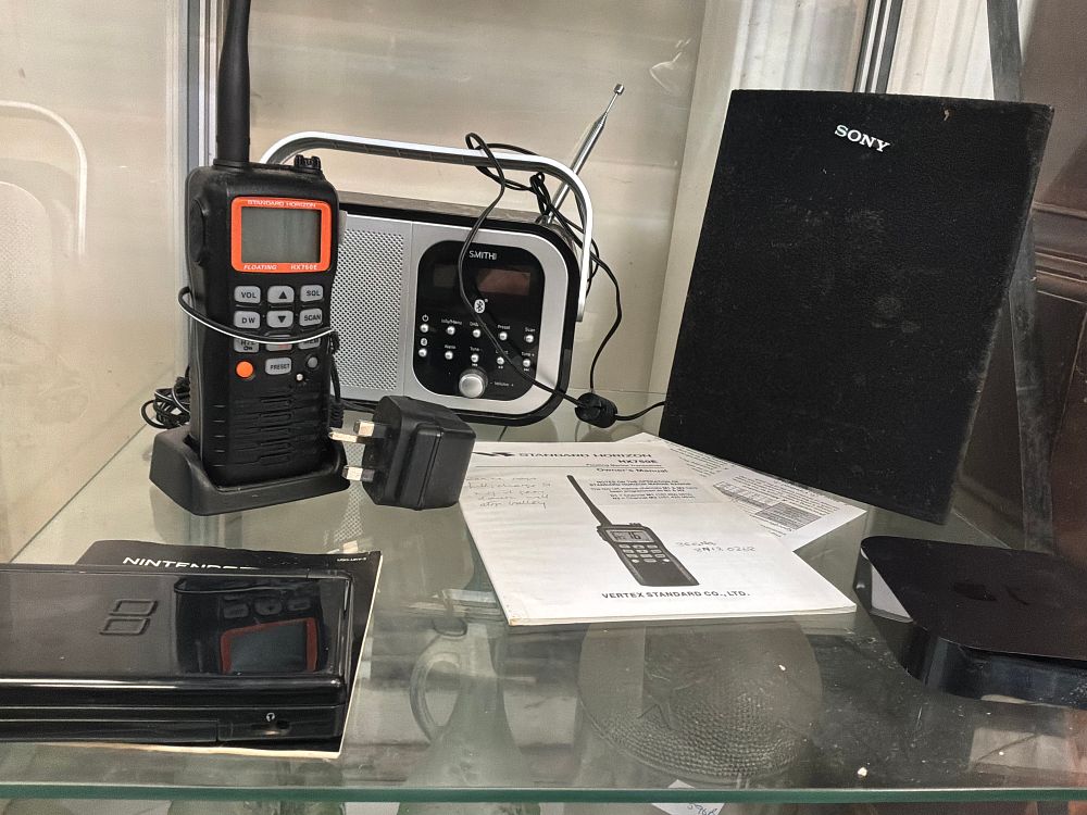 Lot 400: A Collection of Electronic Consumer Goods Including Standard Horizon and Nintendo Examples