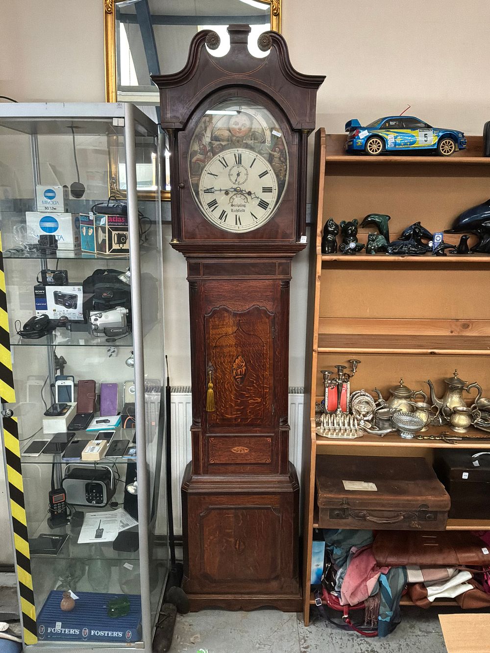 Lot 411: An Early 19th Century Mahogany and Oak Longcase Clock by Stripling of Lichfield