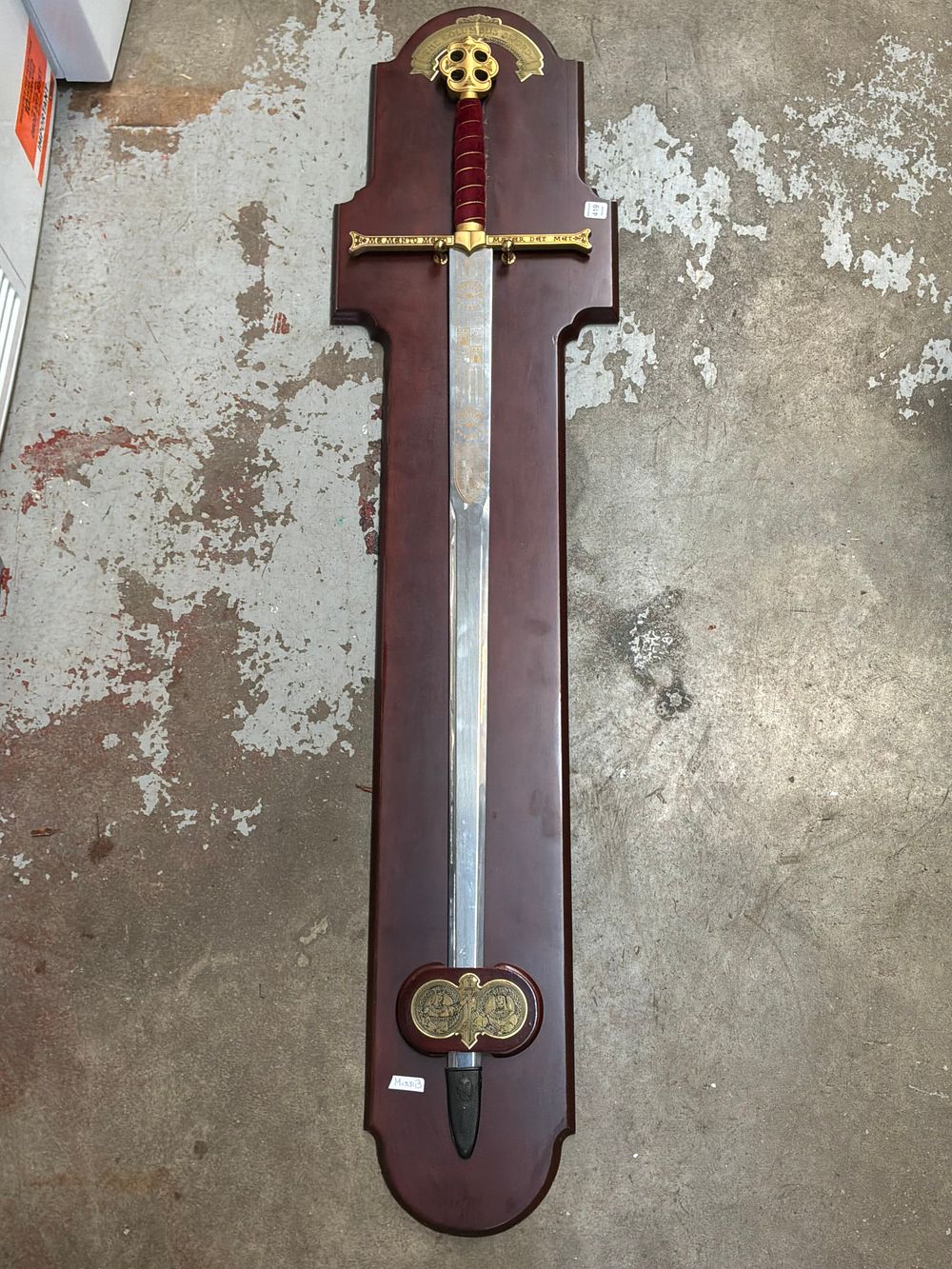 Lot 419: A Decorative Stainless Steel Christopher Columbus Style Sword with Wooden Mounting Plaque