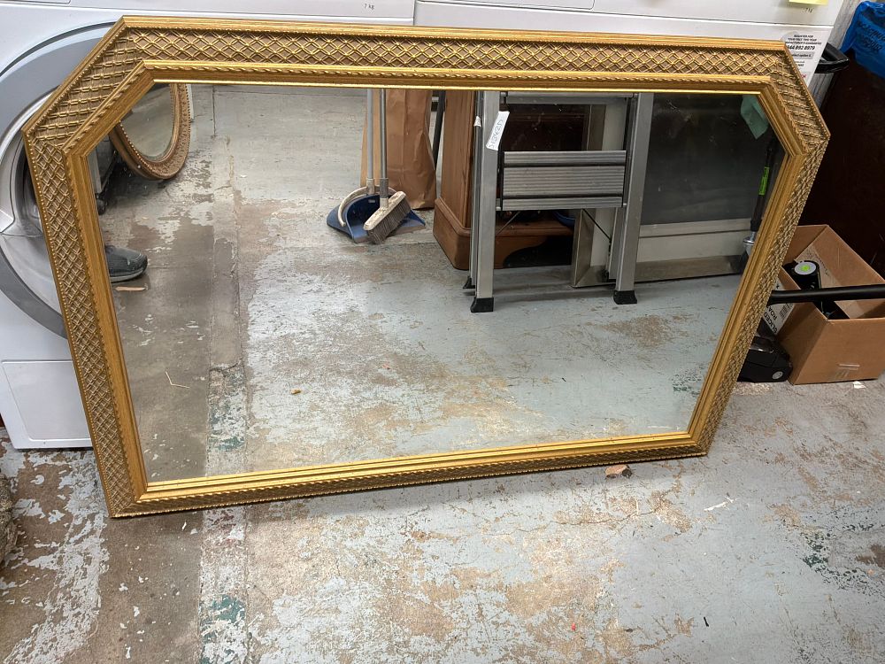 Lot 433: A Large Gilded Octagonal Wall Mirror