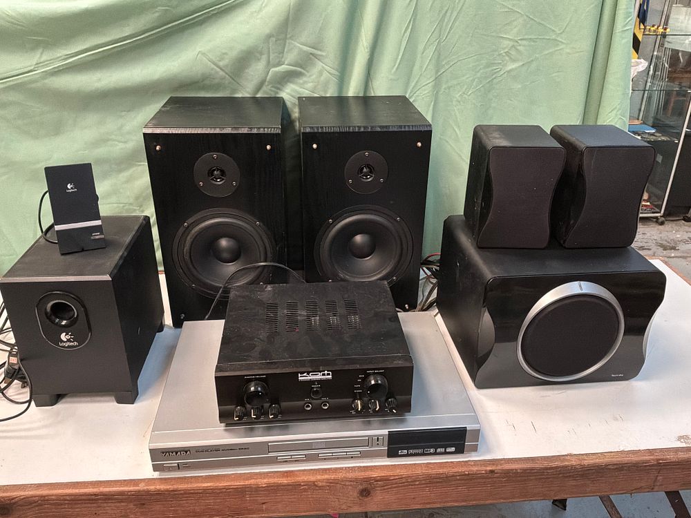 Lot 22: A Collection of Home Audio and Video Equipment including Kam and Logitech Examples