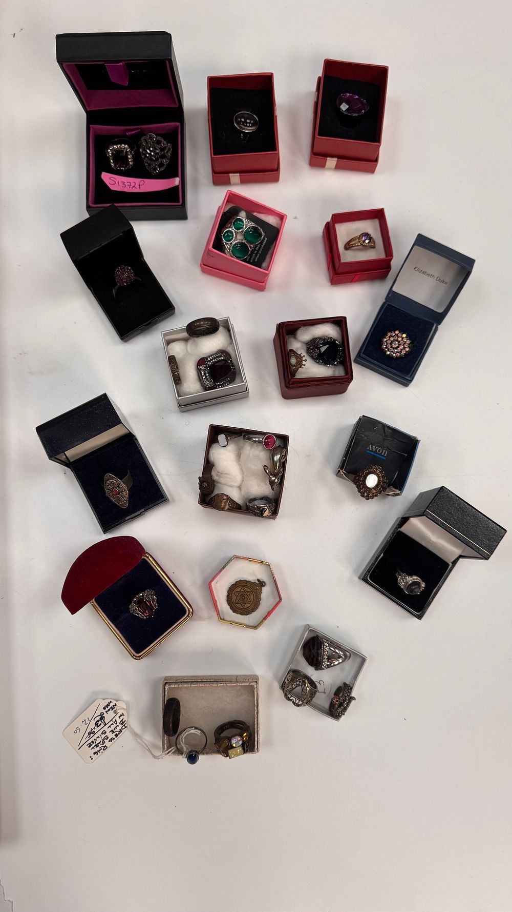 Lot 62: A Collection of Costume Jewellery Rings and a Pendant including Avon and Elizabeth Duke Examples