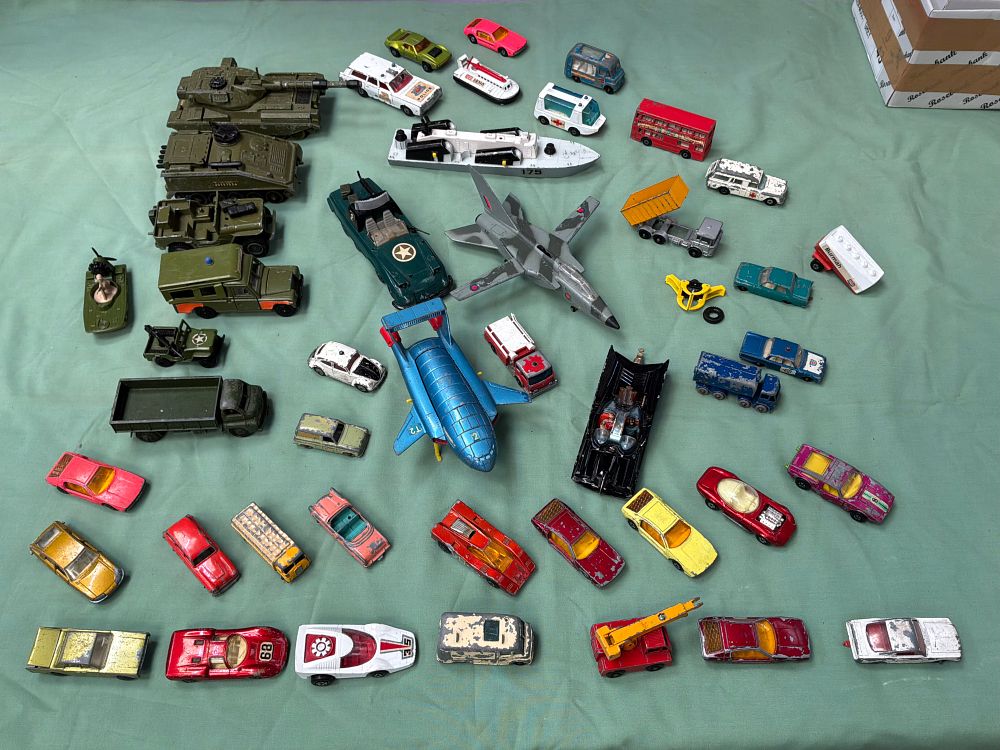 Lot 63: A Collection of Die-Cast Metal Toy Vehicles Including Dinky and Matchbox Examples