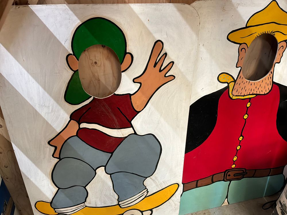 Lot 77: A Pair of Hand Painted Plywood Carnival Photo Stand-in Props