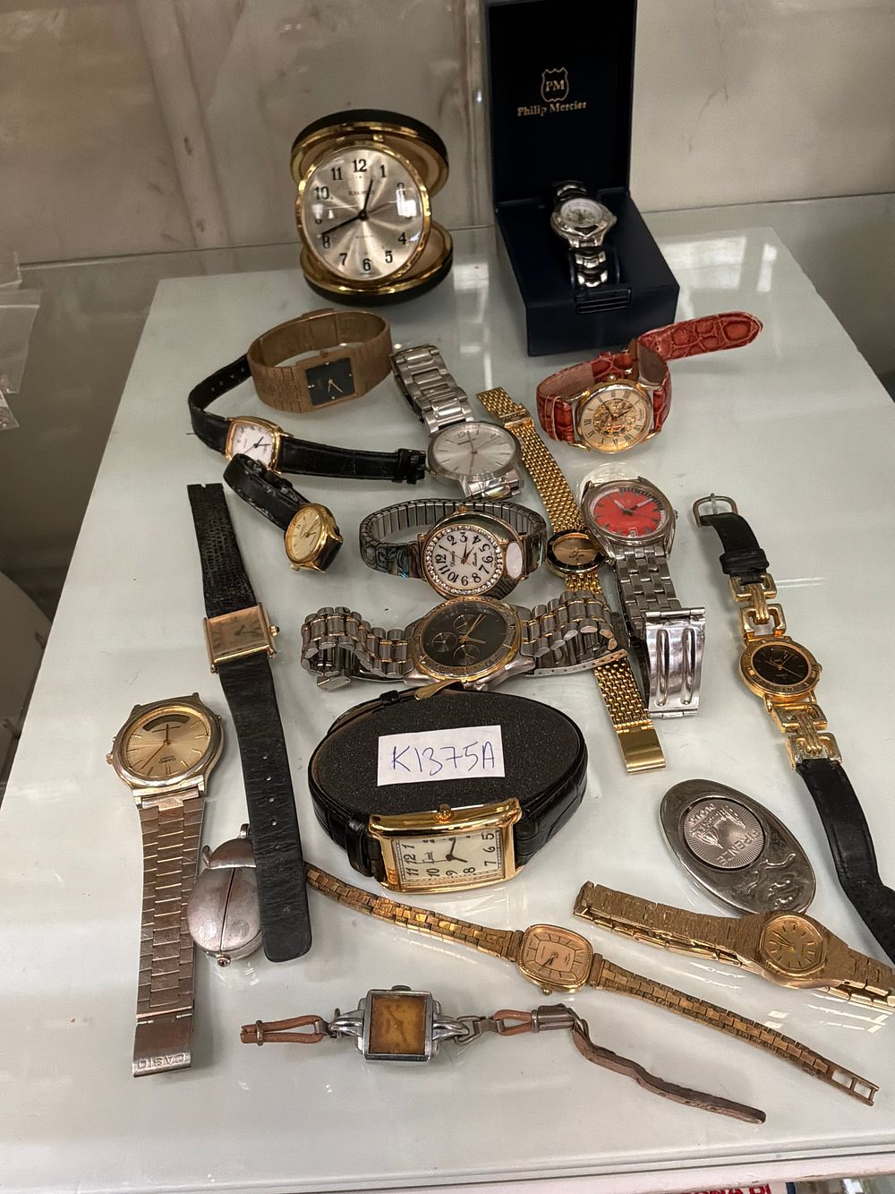 Lot 102: A Collection of Wristwatches and Travel Clocks Including Casio and Sekonda Examples