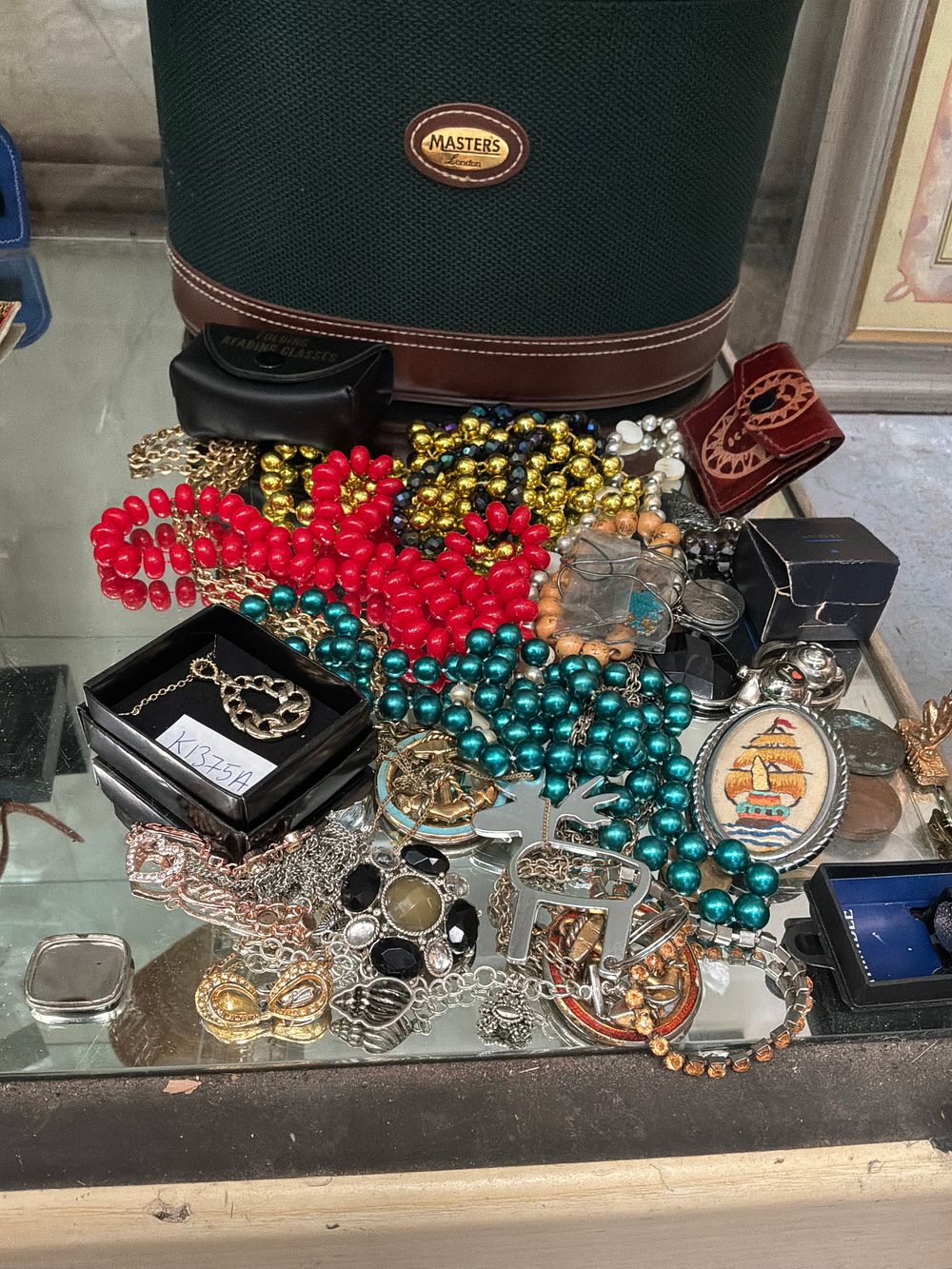 Lot 106: A Collection of Costume Jewellery and Accessories including a Masters London Vanity Case