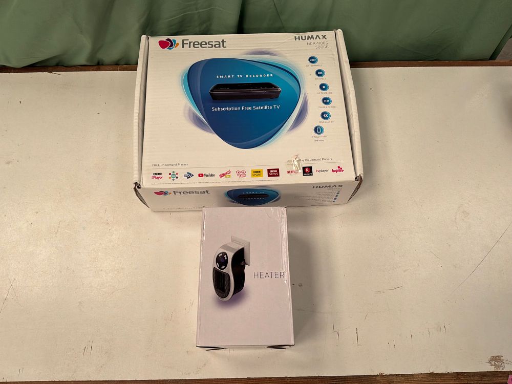Lot 113: A Humax HDR-1100S Freesat Smart TV Recorder and a Portable Plug-in Heater