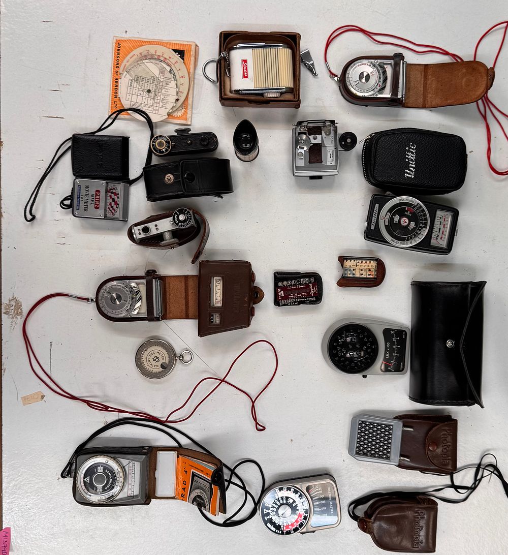 Lot 116: A Collection of Vintage Photographic Exposure Meters and Accessory Equipment including Weston and Leningrad Examples