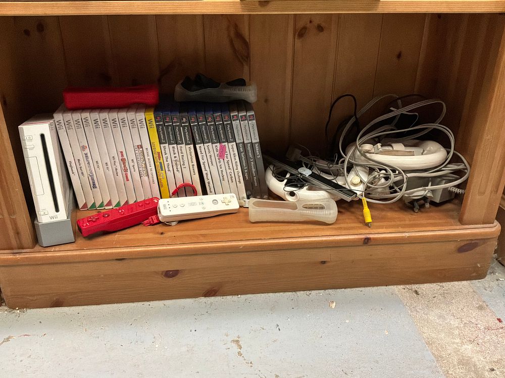 Lot 123: A Collection of Nintendo Wii and PlayStation 2 Gaming Equipment and Software