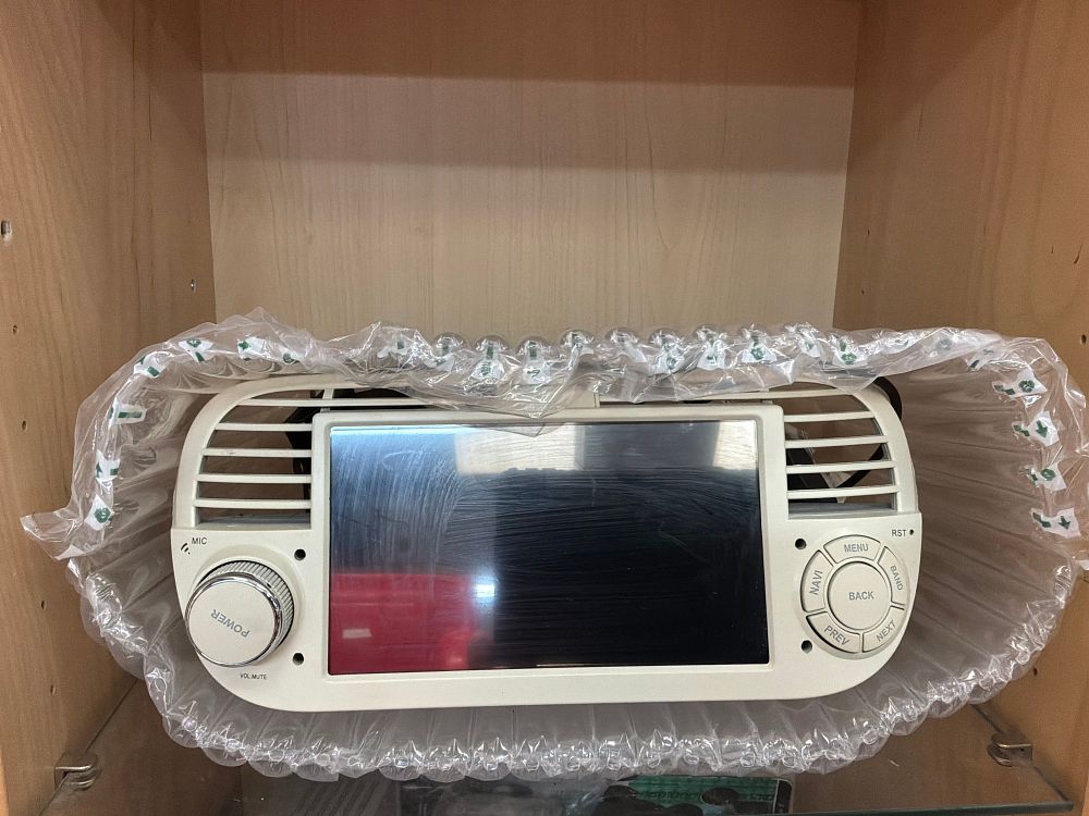 Lot 136: A Fiat 500 style Touchscreen Multimedia Head Unit with Fascia and Wiring Harness