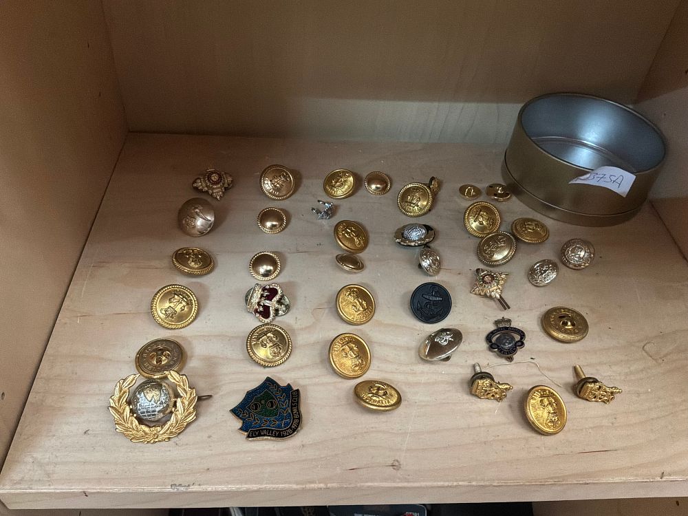 Lot 138: A Collection of British and Commonwealth Military Badges and Buttons Including Stokes and Sons Examples